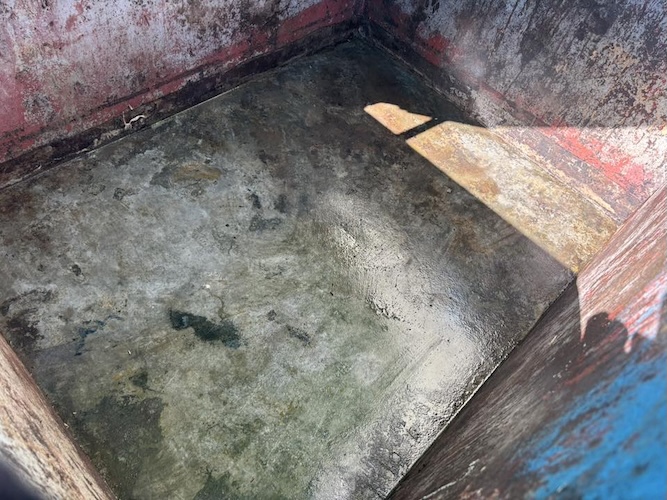 clean metal bin with sun on it